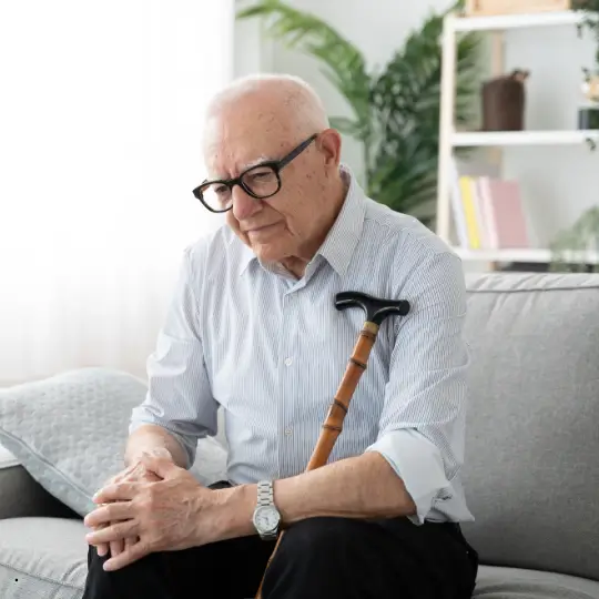 Older man enjoying a quiet moment at home.